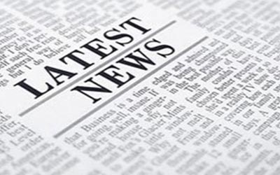 Clipart-style image of a newspaper focused on a headline reading: Latest News.